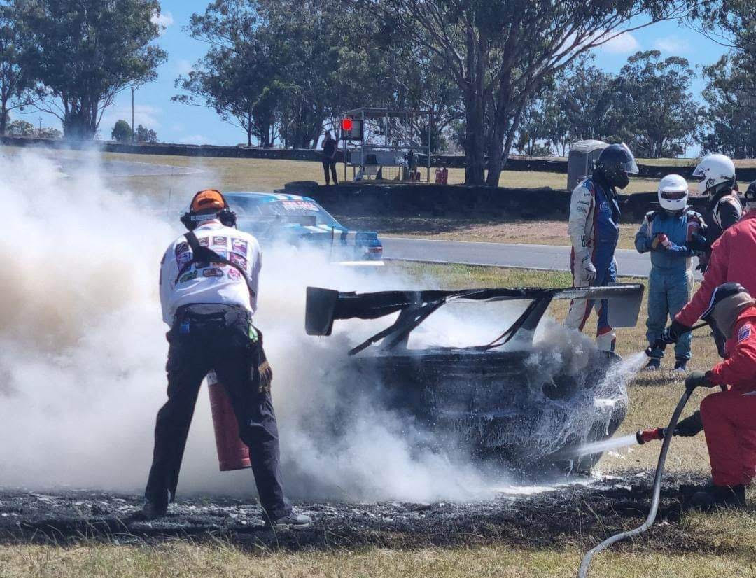 Swampy and QFRC members putting out a fire on a Mosler