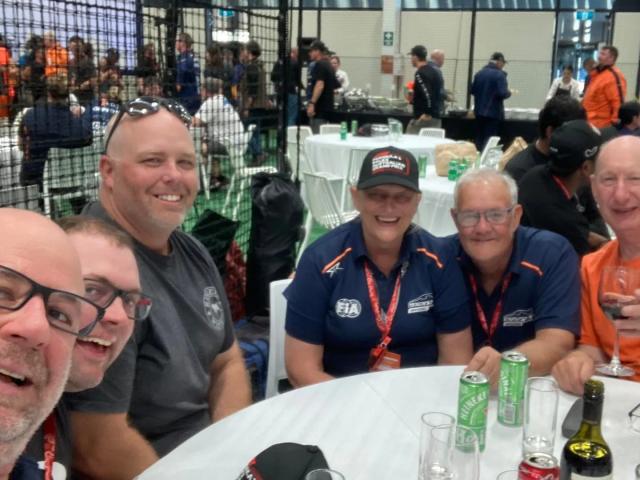 Officials enjoying a drink after the Australian Grand Prix